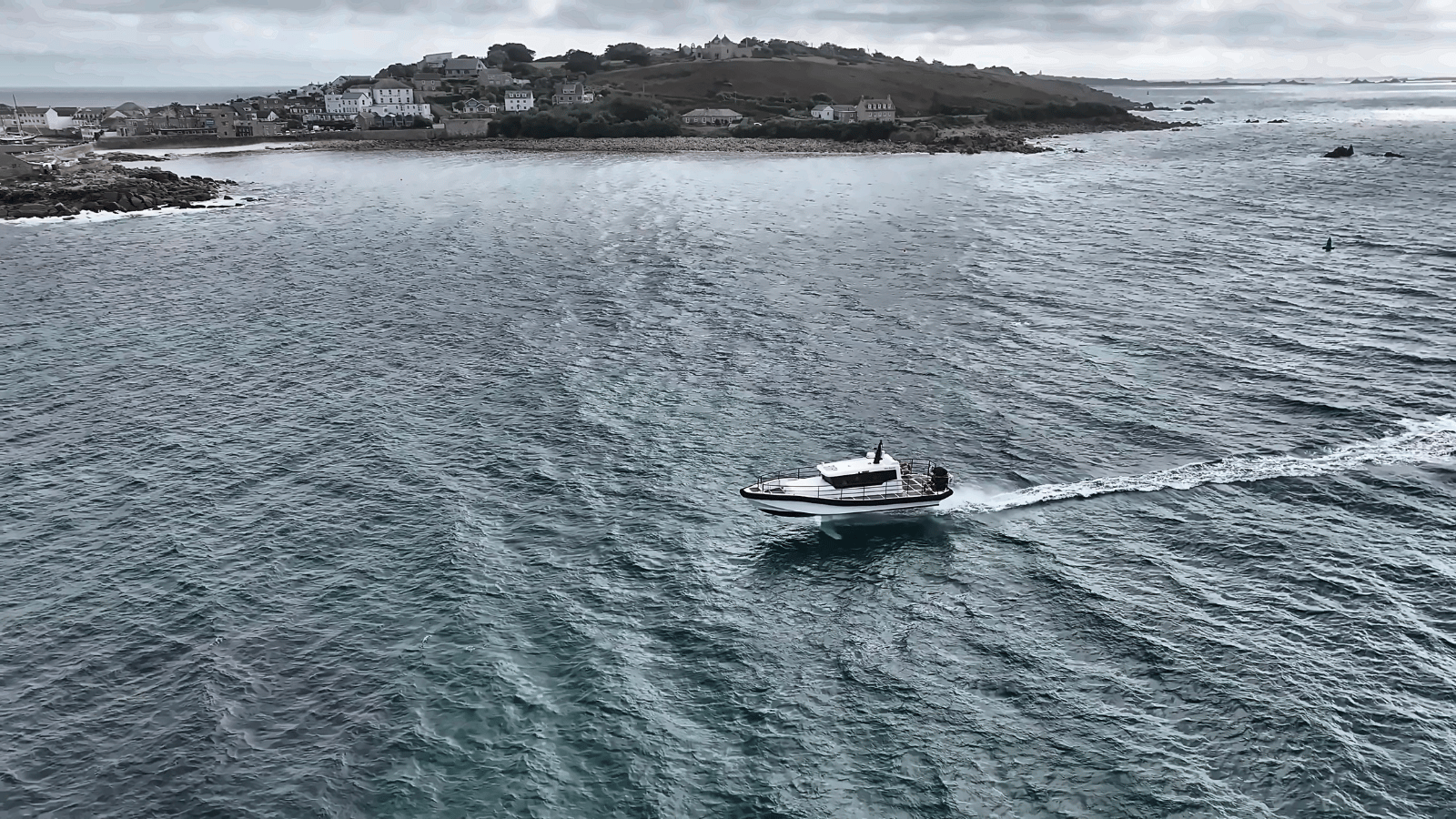 Hydrofoil boat with islands in background