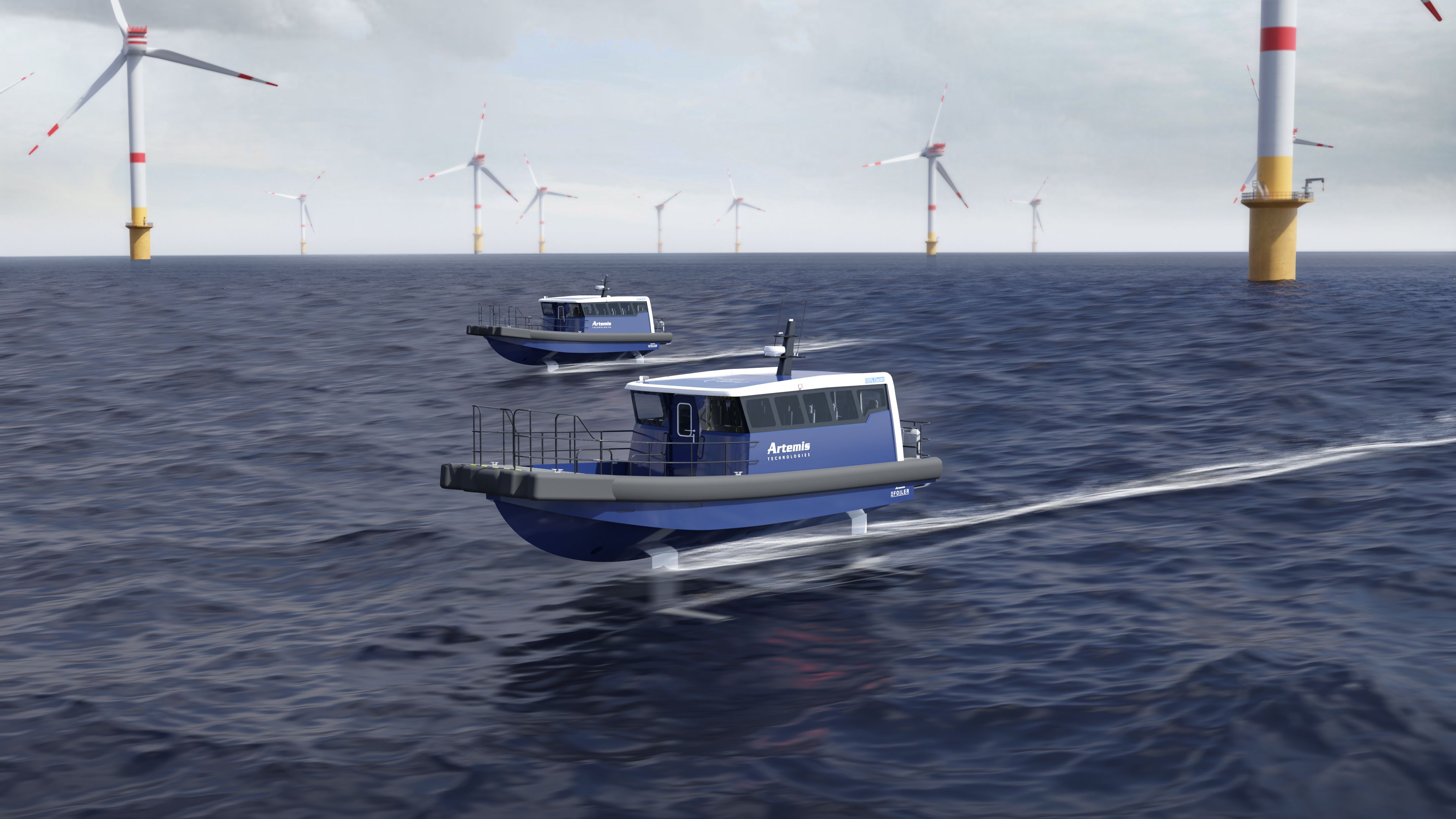 Two 12 metre crew transfer vessels foiling at an offshore wind farm with wind turbines in the background