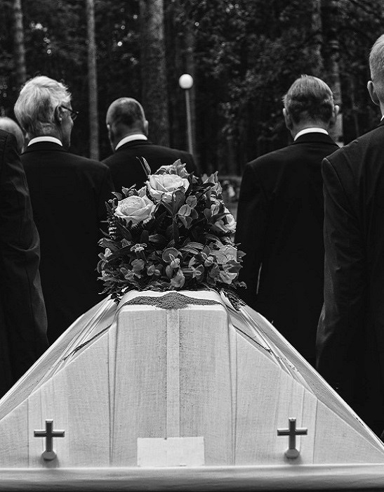 Man Researching Funeral Plans