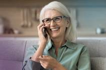 Smiling lady on phone