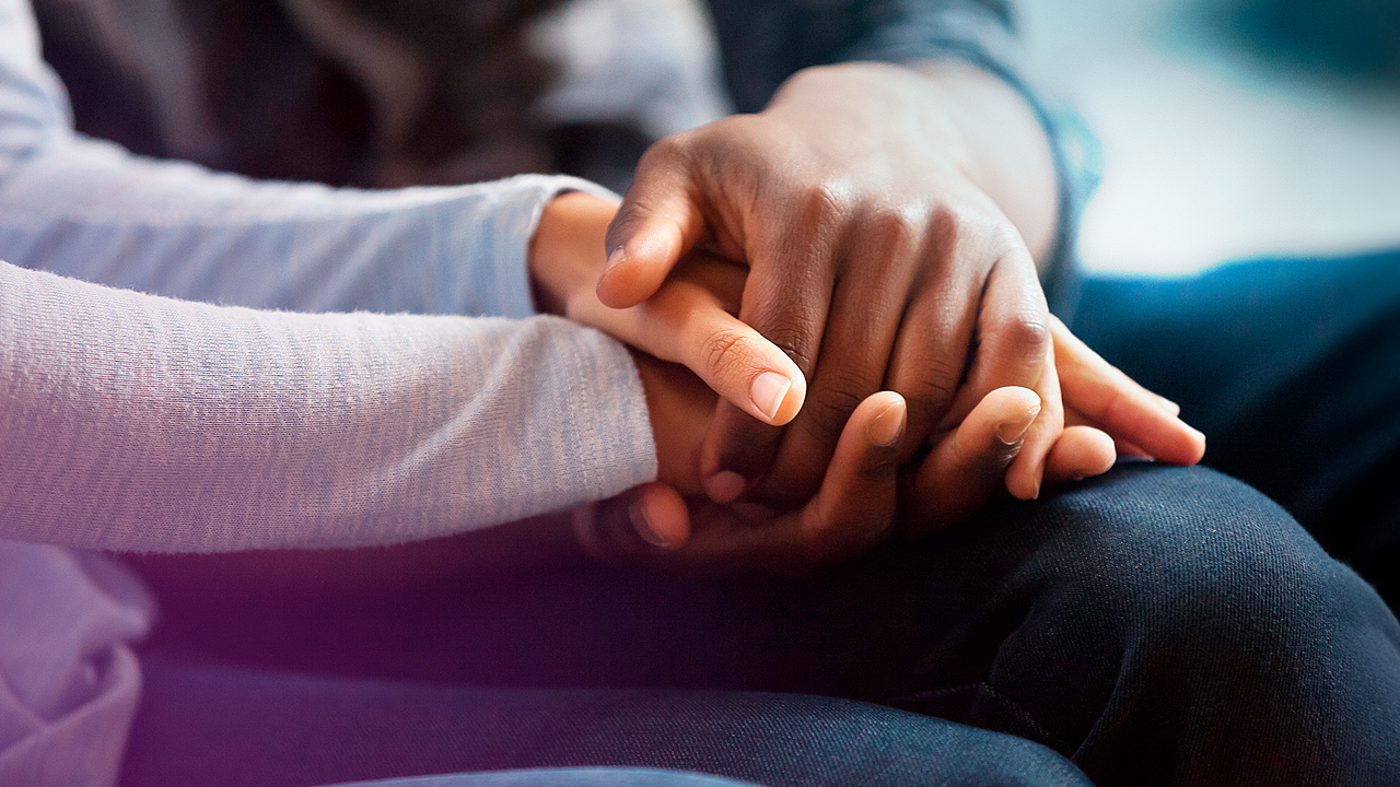 Hands Clasped In Lap Desktop Banner