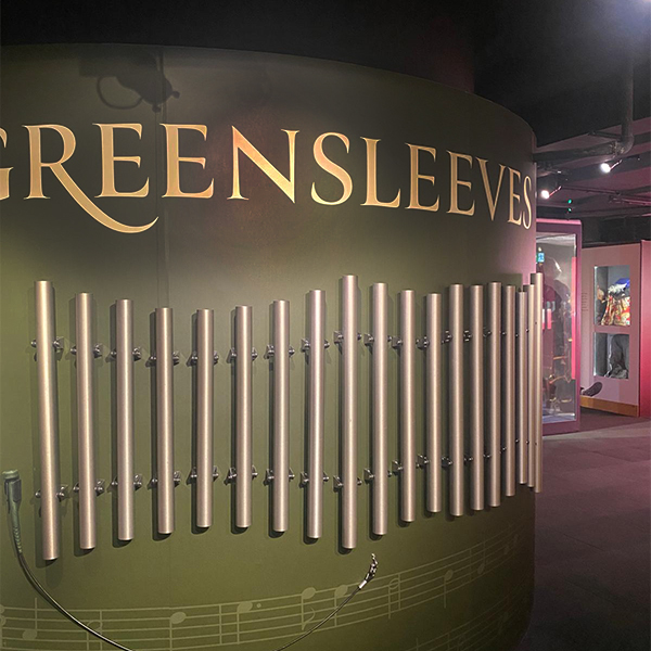 Close-up of custom-tuned MyTunes chimes arranged to play the melody of Greensleeves when struck in sequence