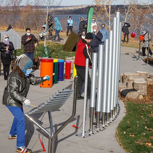 opening of the Quinterra Legacy Musical Garden in Calgary with musical chimes outdoor drums and outdoor xylophones
